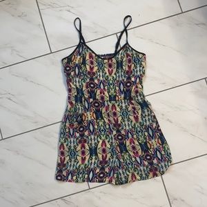 Super light weight romper with pockets.